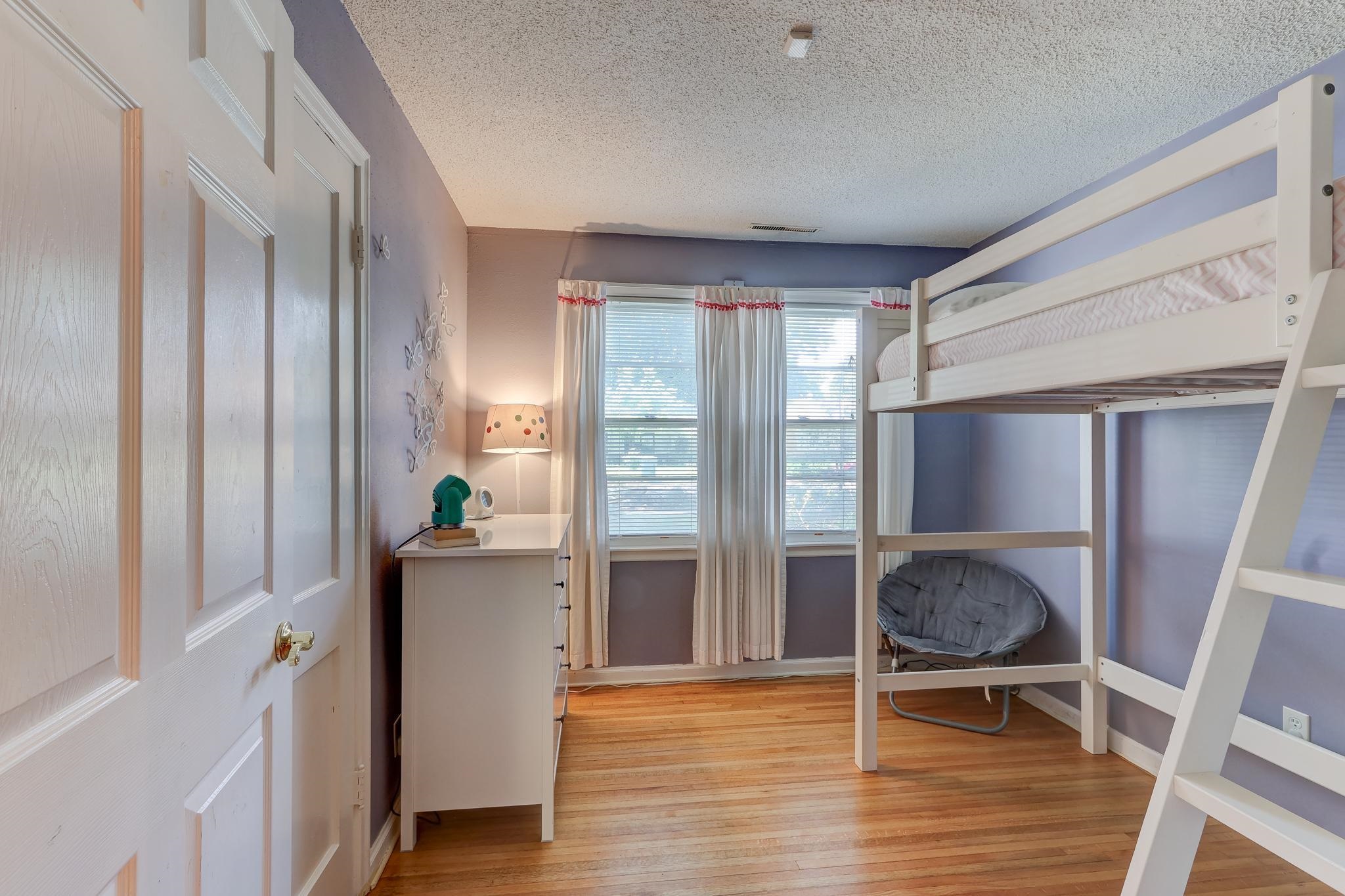 1524 Flamingo Road Memphis, TN 38117 - Photo 12 of 20 a view of a livingroom with furniture and staircase