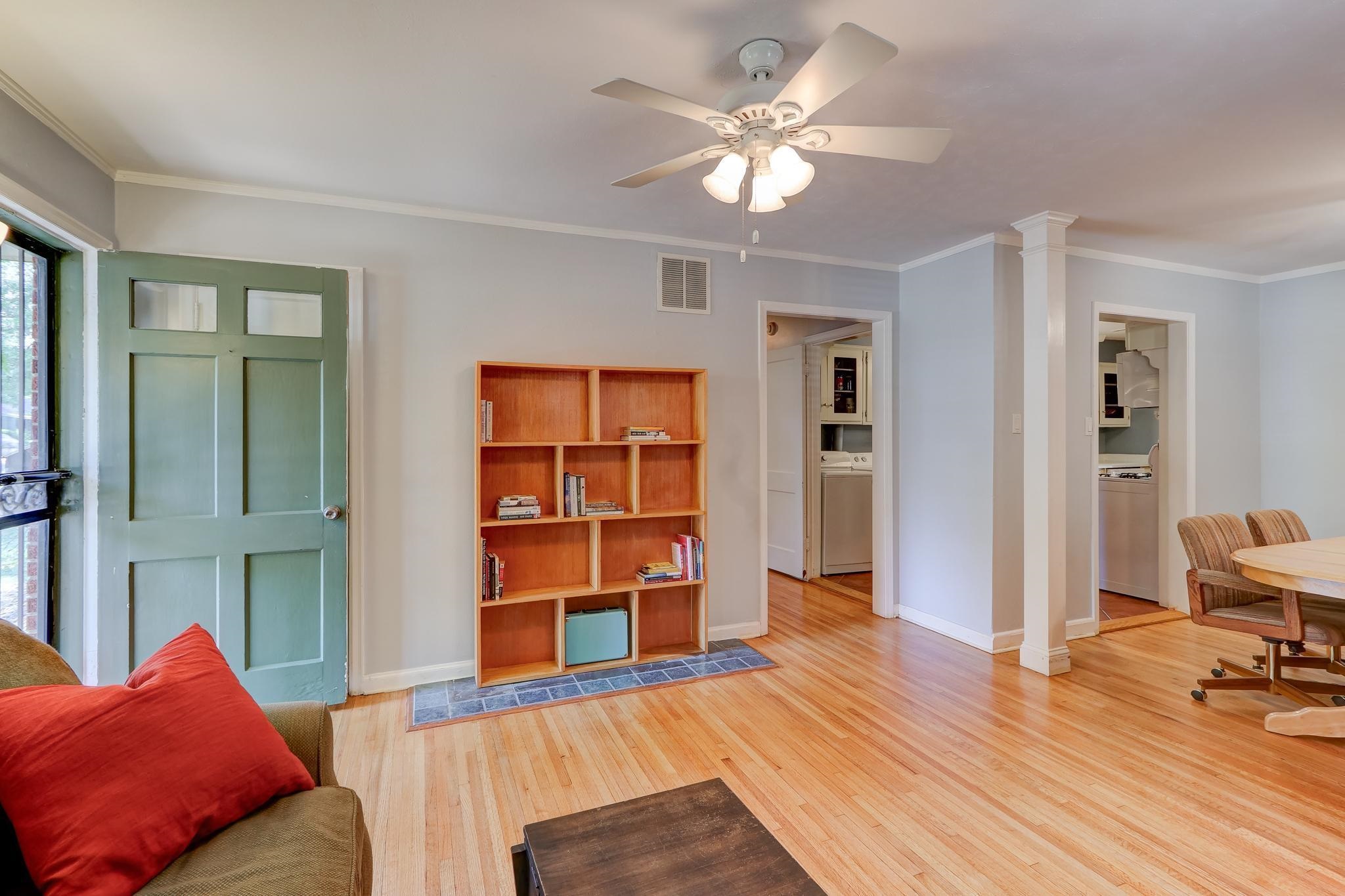 1524 Flamingo Road Memphis, TN 38117 - Photo 2 of 20 a living room with furniture and a book shelf