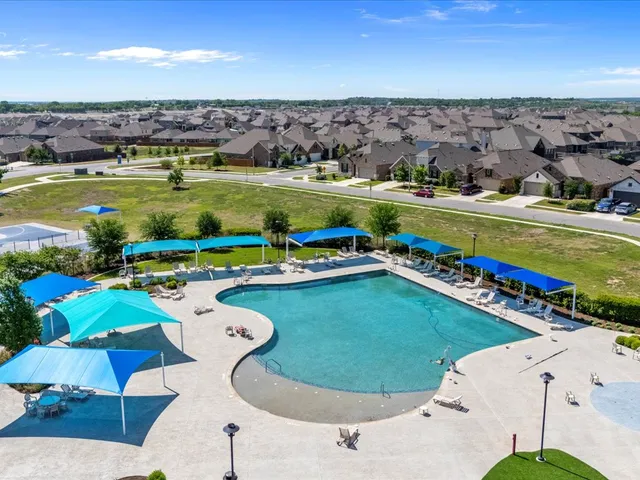 a view of a swimming pool and lake view