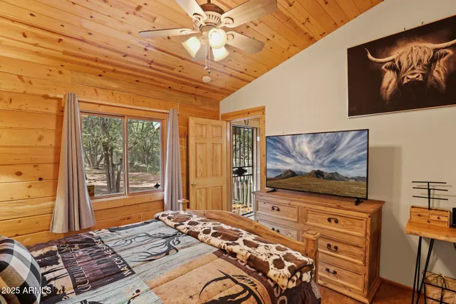 a bed room with a bed and furniture