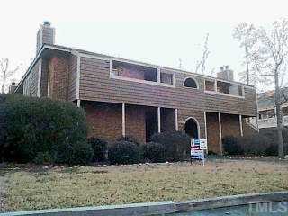 3301 Mill Run Raleigh, NC 27612 - Photo 1 of 1 a front view of a house with garage