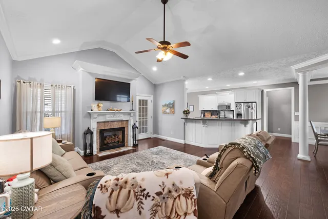 a bedroom with a bed and a fireplace