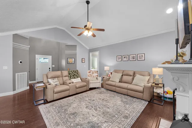 a living room with furniture and a couch