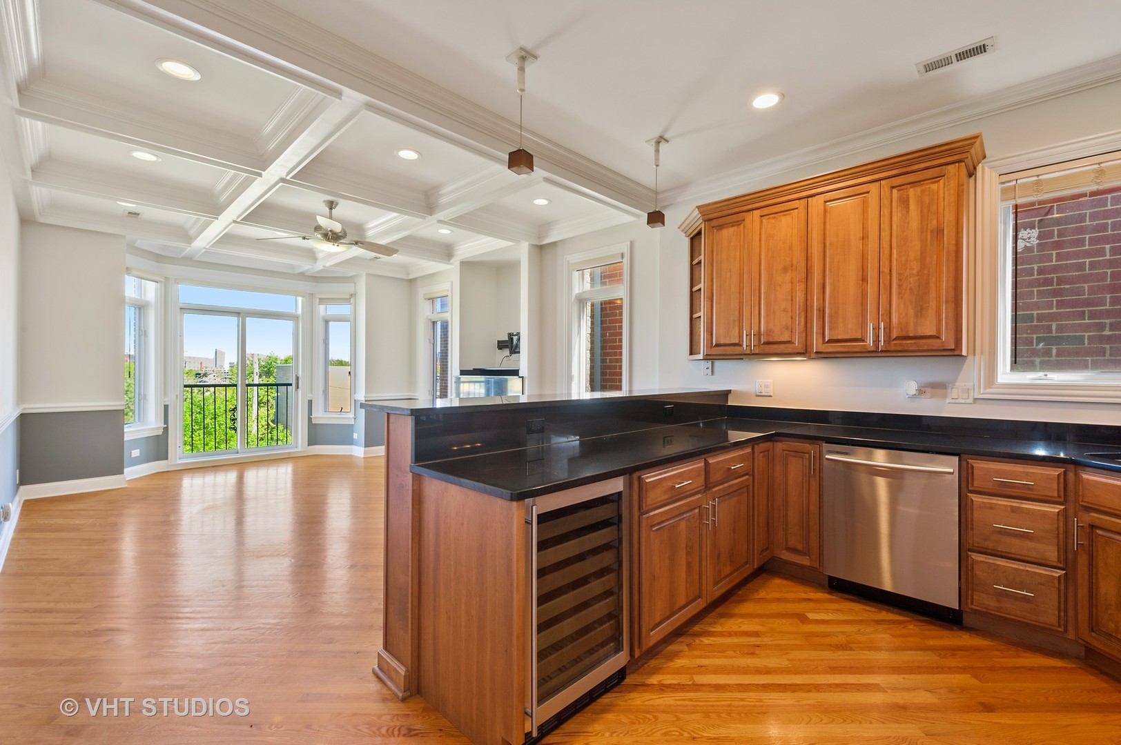 2022 North Wood Street, Unit 3S Chicago, IL 60614 - Photo 3 of 13 a large kitchen with stainless steel appliances granite countertop a stove and a sink