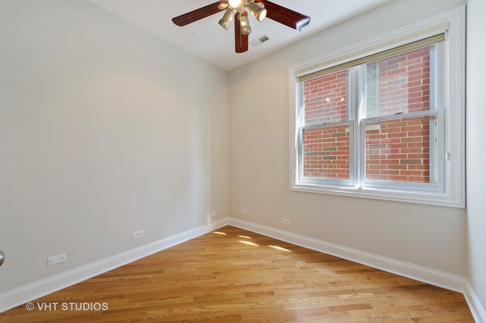 2022 North Wood Street, Unit 3S Chicago, IL 60614 - Photo 10 of 13 an empty room with window