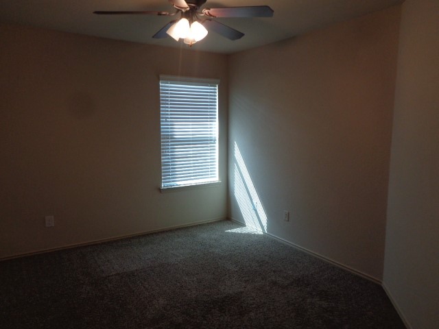 23314 Brat Pass Drive Spring, TX 77373 - Photo 14 of 20 a view of an empty room with a window