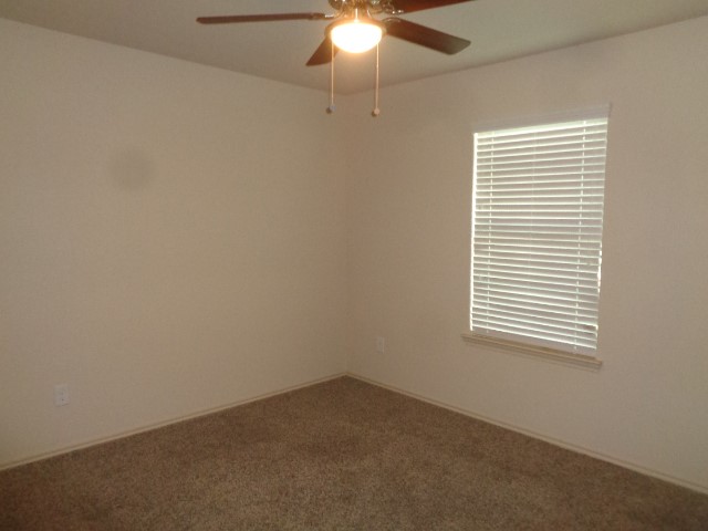 23314 Brat Pass Drive Spring, TX 77373 - Photo 17 of 20 an empty room with a window