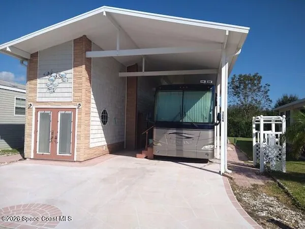 a front view of a house with a garage