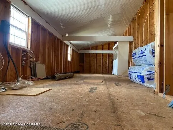 a view of a livingroom with furniture