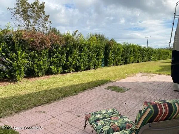 a view of a yard with an trees