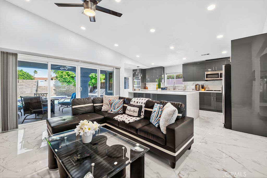 68830 Jarana Road Cathedral City, CA 92234 - Photo 14 of 28 a living room with furniture and a large window