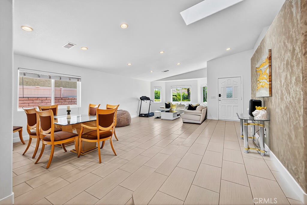 68830 Jarana Road Cathedral City, CA 92234 - Photo 5 of 28 a living room with furniture and a large window