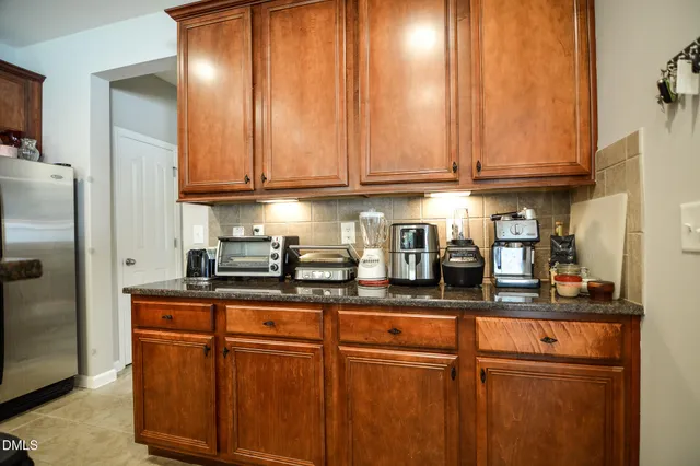a view of a livingroom with furniture and wooden floor