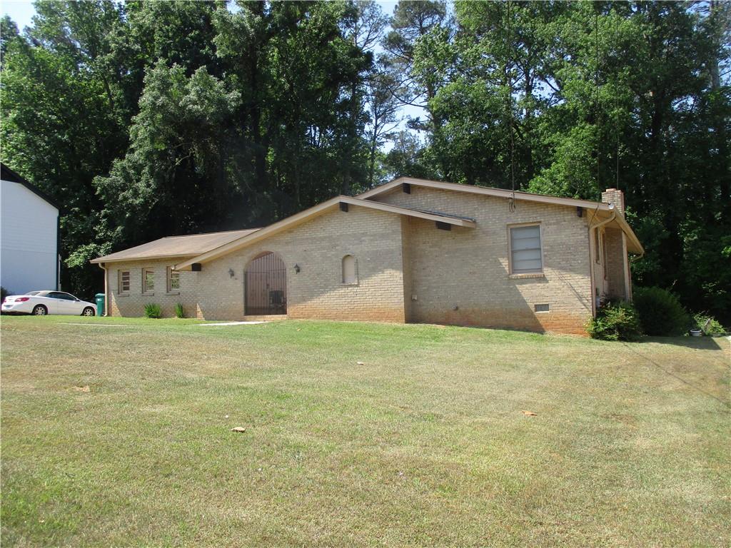 235 Killian Hill Road Northwest Lilburn, GA 30047 - Photo 1 of 18