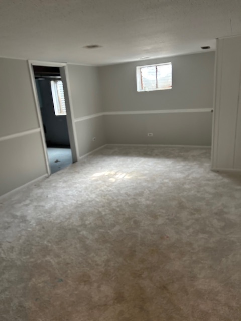 2186 North Oakbrook Circle, Unit 2186 Palatine, IL 60074 - Photo 11 of 11 an empty room with a window