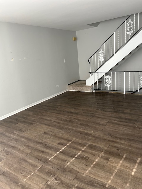 2186 North Oakbrook Circle, Unit 2186 Palatine, IL 60074 - Photo 10 of 11 a view of room with wooden floor