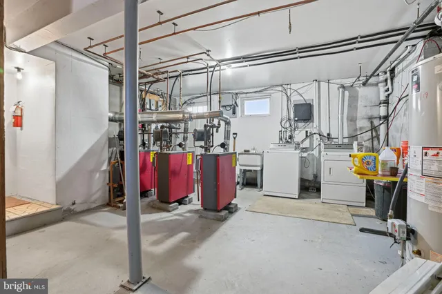 an aerial view of a house with garden space and street view
