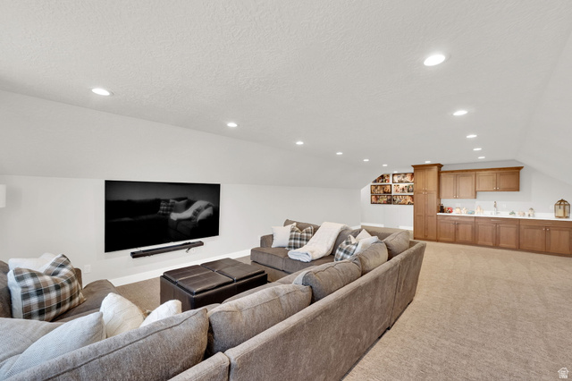 352 East Boulderville Road Oakley, UT 84055 - Photo 28 of 62 Living area featuring light colored carpet and recessed lighting