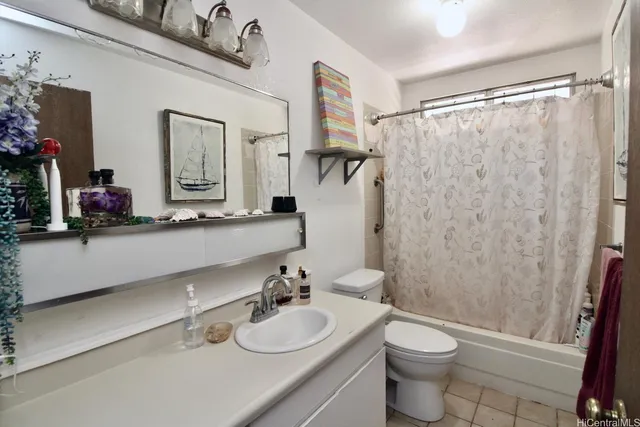 a view of a house with backyard porch and sitting area