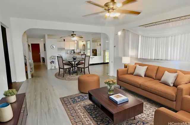 a bedroom with bed and a window