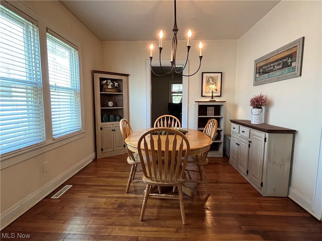 1902 Mathoit Street Parkersburg, WV 26101 - Photo 9 of 35 Dining space with dark hardwood flooring