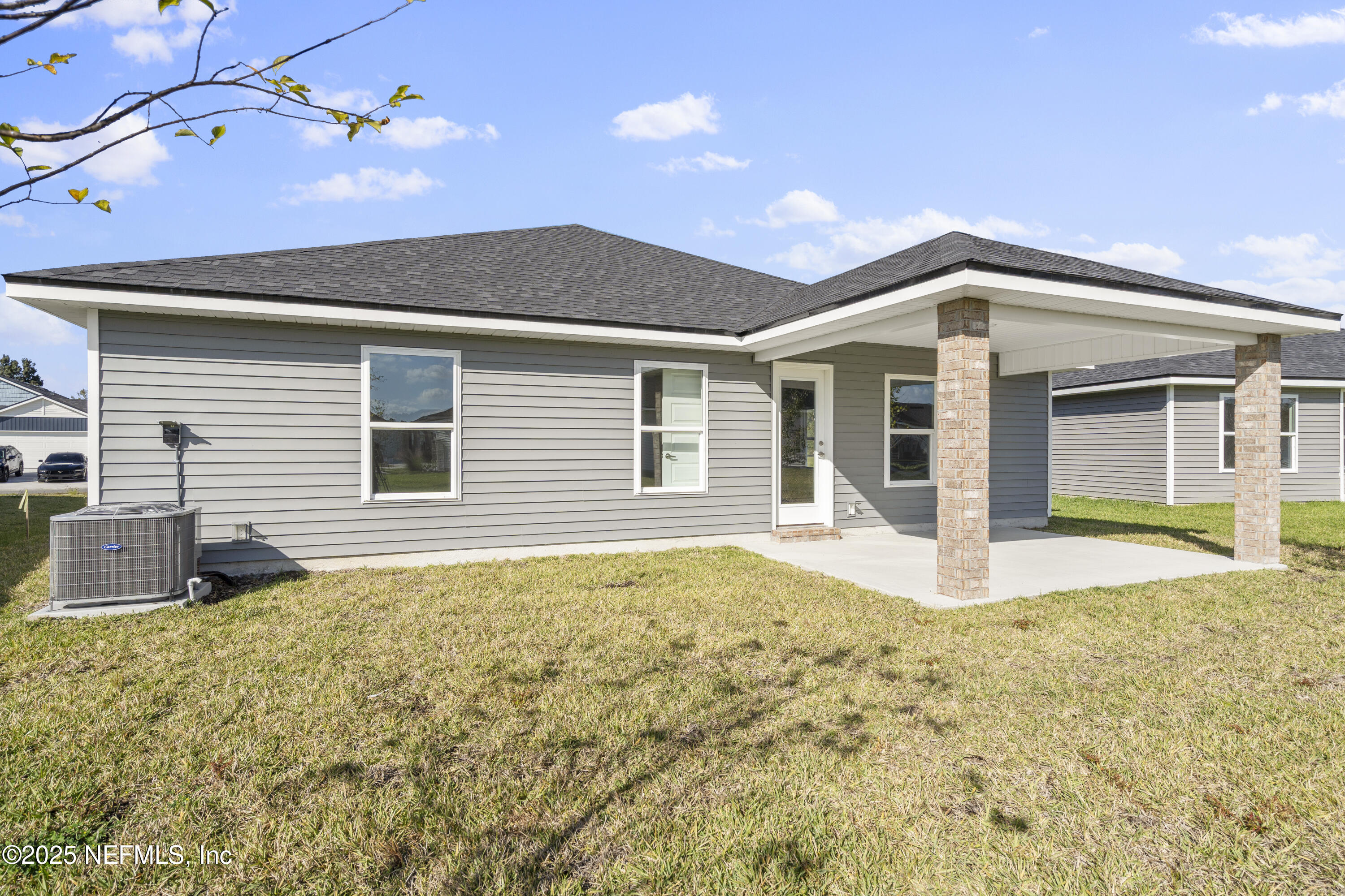 8390 Helmsley Boulevard Jacksonville, FL 32219 - Photo 5 of 24 Exterior Rear