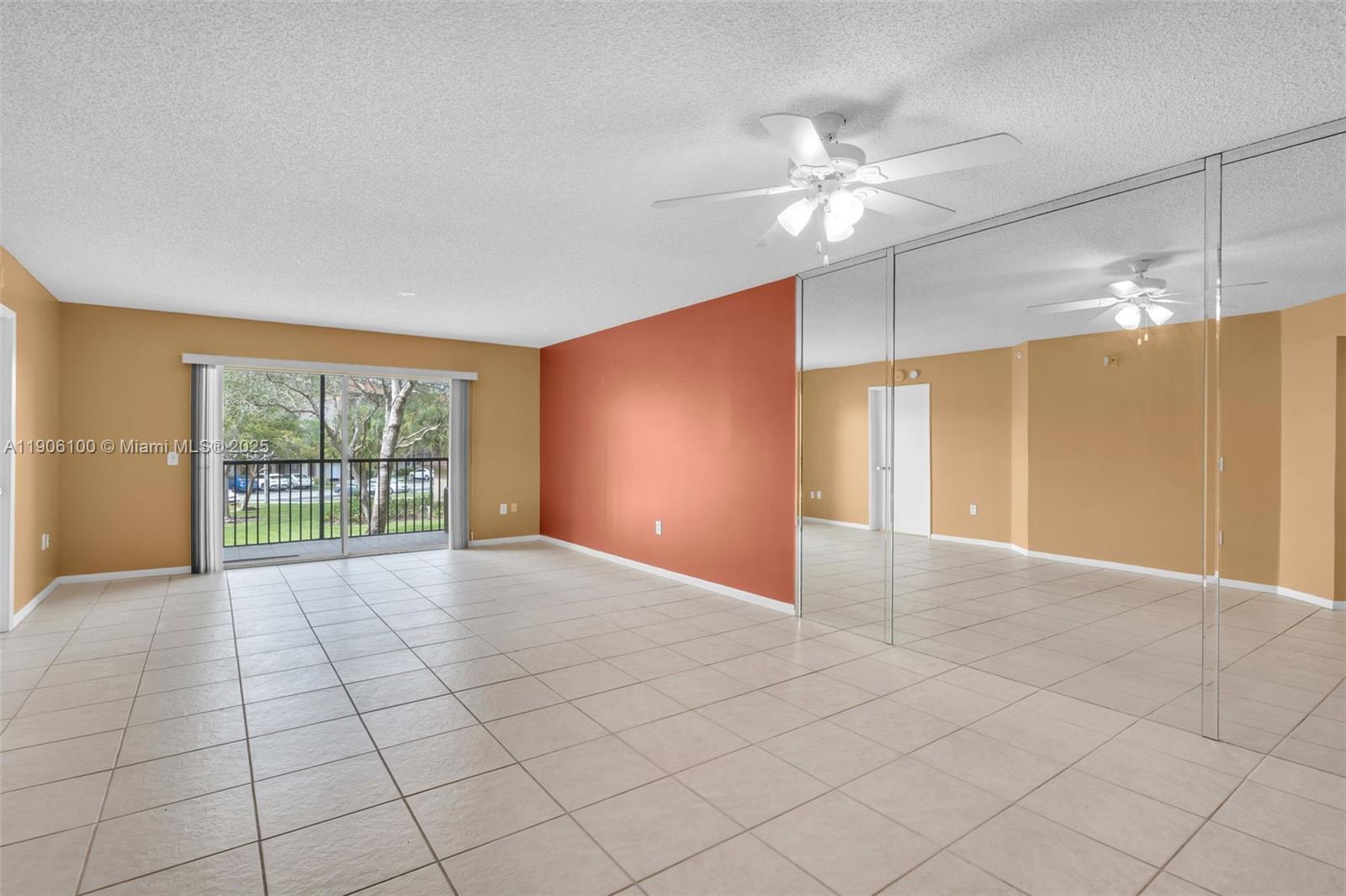 550 Southwest 137th Avenue, Unit 208L Pembroke Pines, FL 33027 - Photo 4 of 18 a view of an empty room with a window