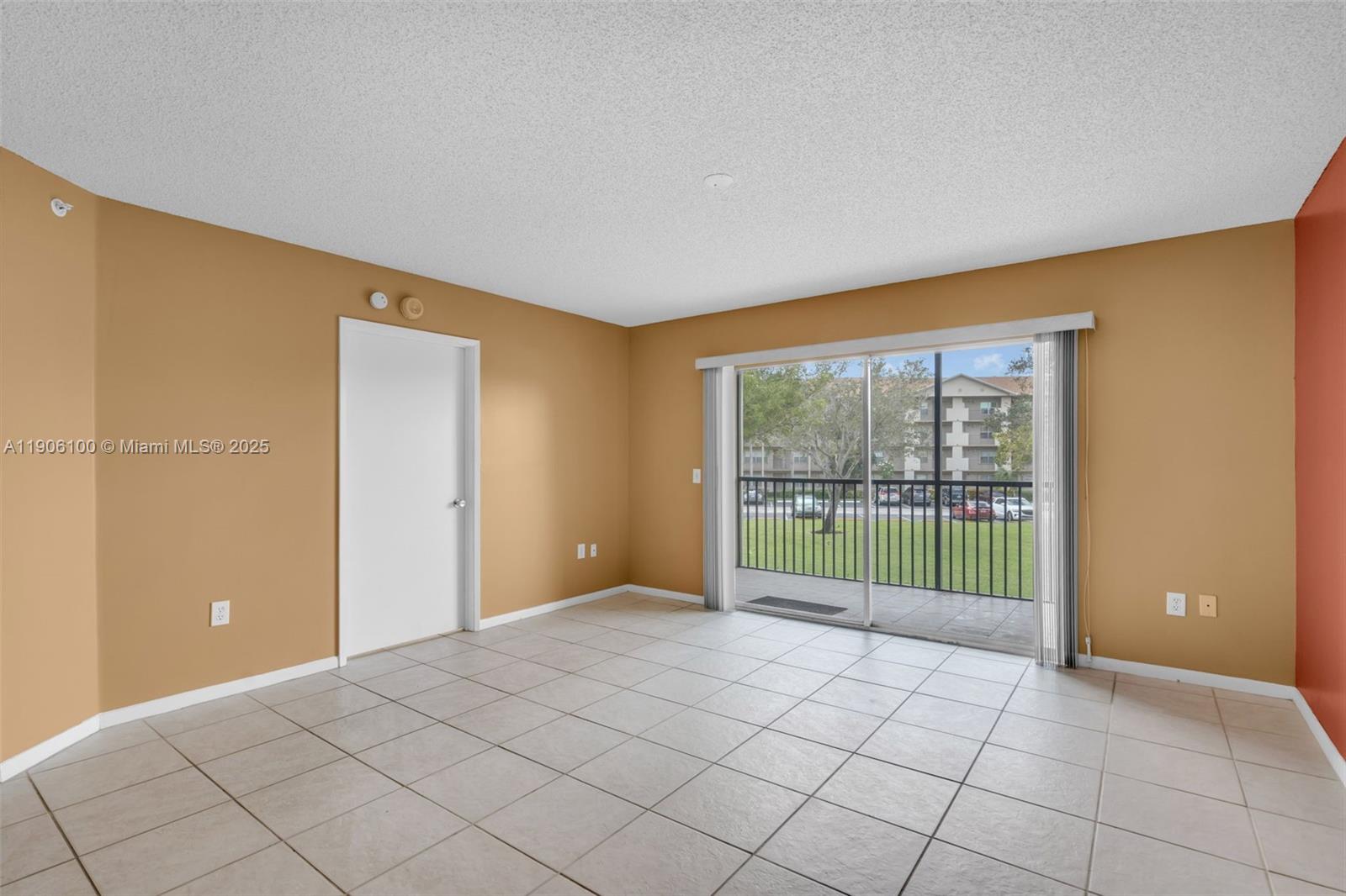 550 Southwest 137th Avenue, Unit 208L Pembroke Pines, FL 33027 - Photo 5 of 18 a view of room with natural light