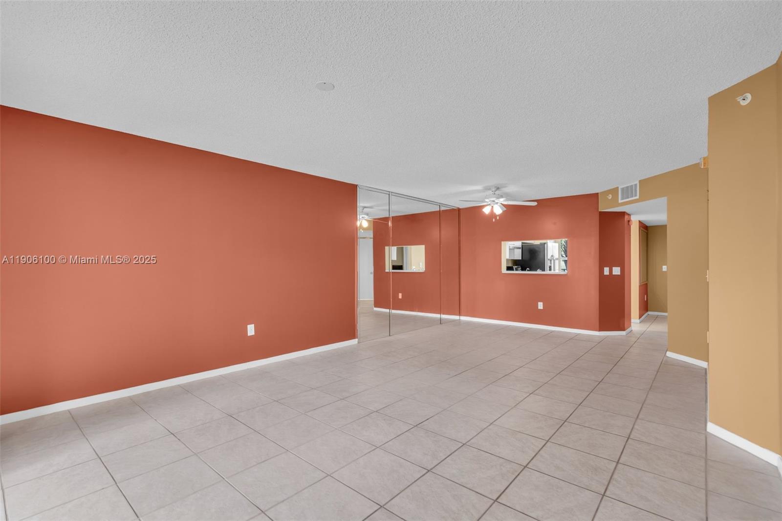 550 Southwest 137th Avenue, Unit 208L Pembroke Pines, FL 33027 - Photo 6 of 18 a view of a big room with wooden floor