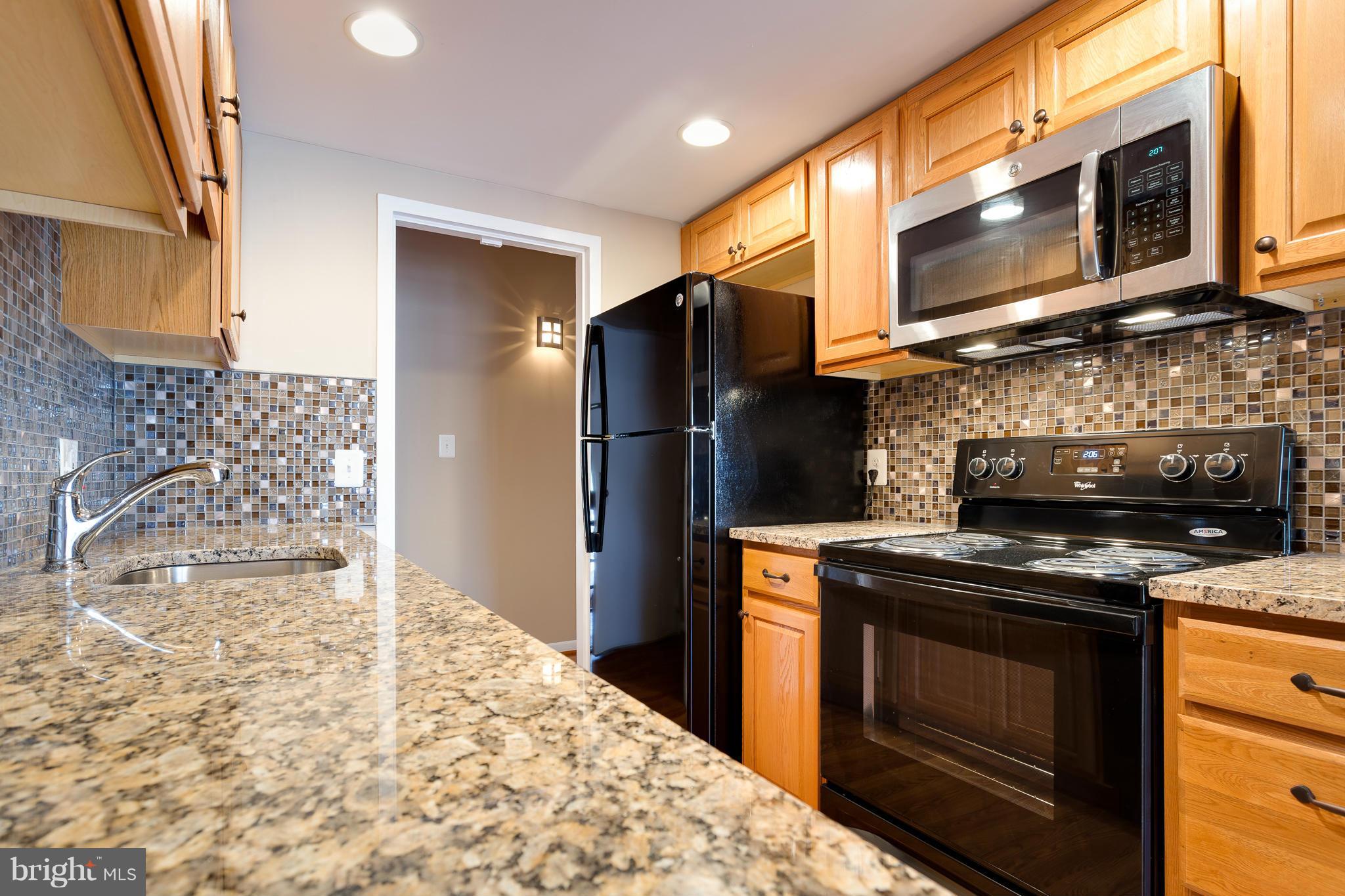 2257 Castle Rock Square, Unit 21C Reston, VA 20191 - Photo 4 of 27 Kitchen