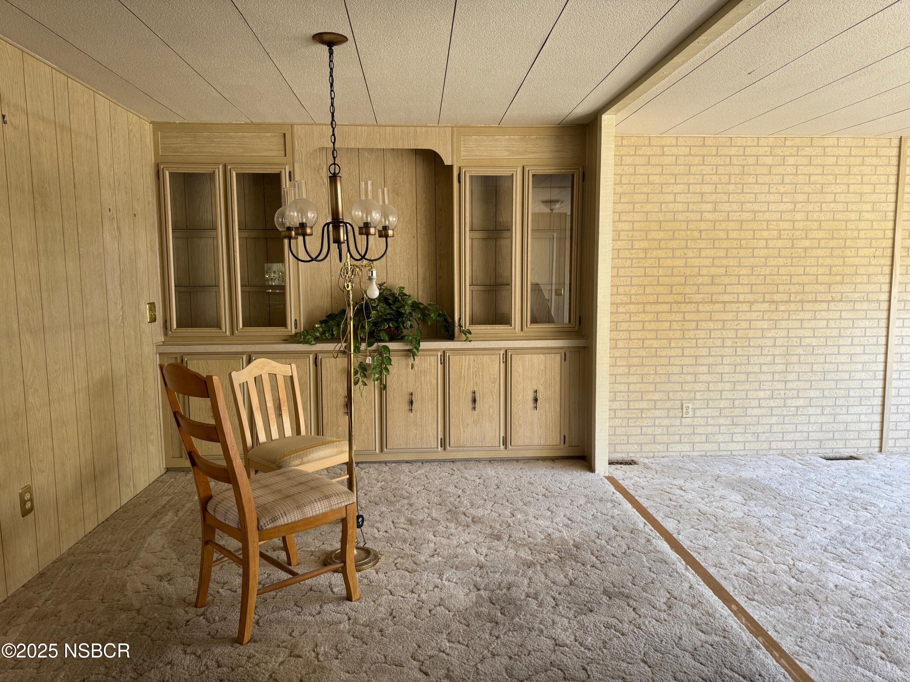 22 Via Del Sol Solvang, CA 93463 - Photo 7 of 16 a view of a door and chair in the house