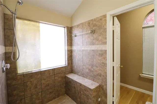 a view of a balcony with a door