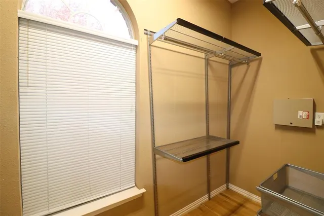 a bathroom with a glass shower door