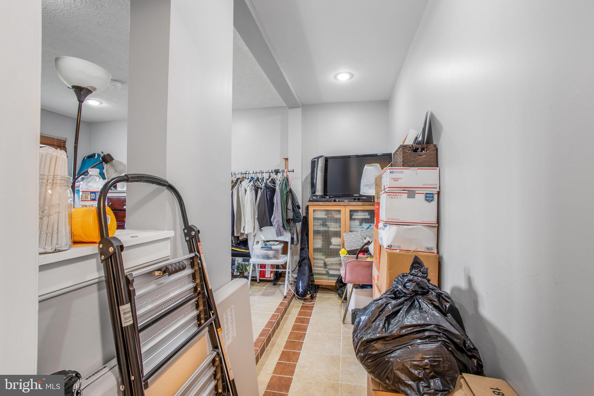 9820 Berrywood Court Bowie, MD 20721 - Photo 11 of 43 a view of a room with gym equipment