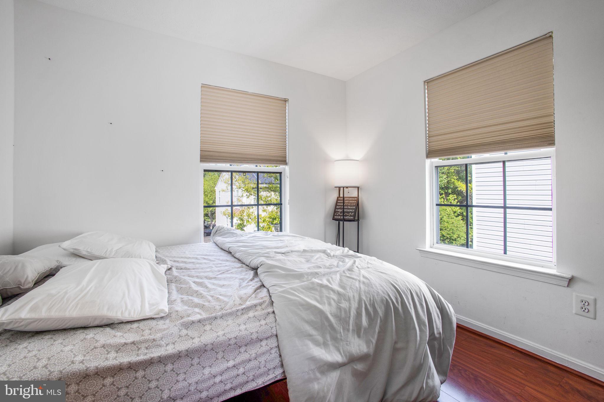 9820 Berrywood Court Bowie, MD 20721 - Photo 15 of 43 a bedroom with a bed and a window