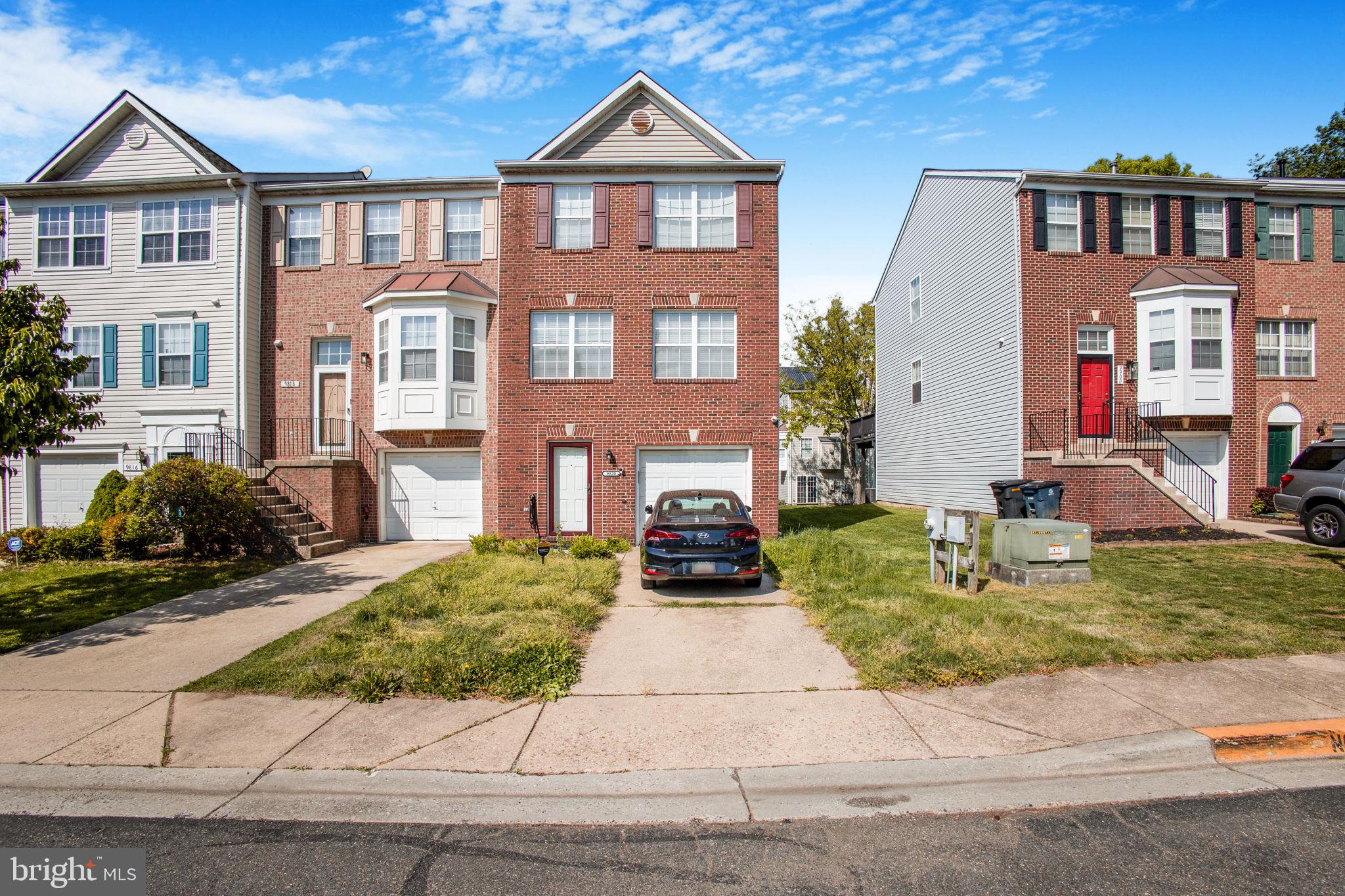 9820 Berrywood Court Bowie, MD 20721 - Photo 32 of 43 a front view of a house with garden