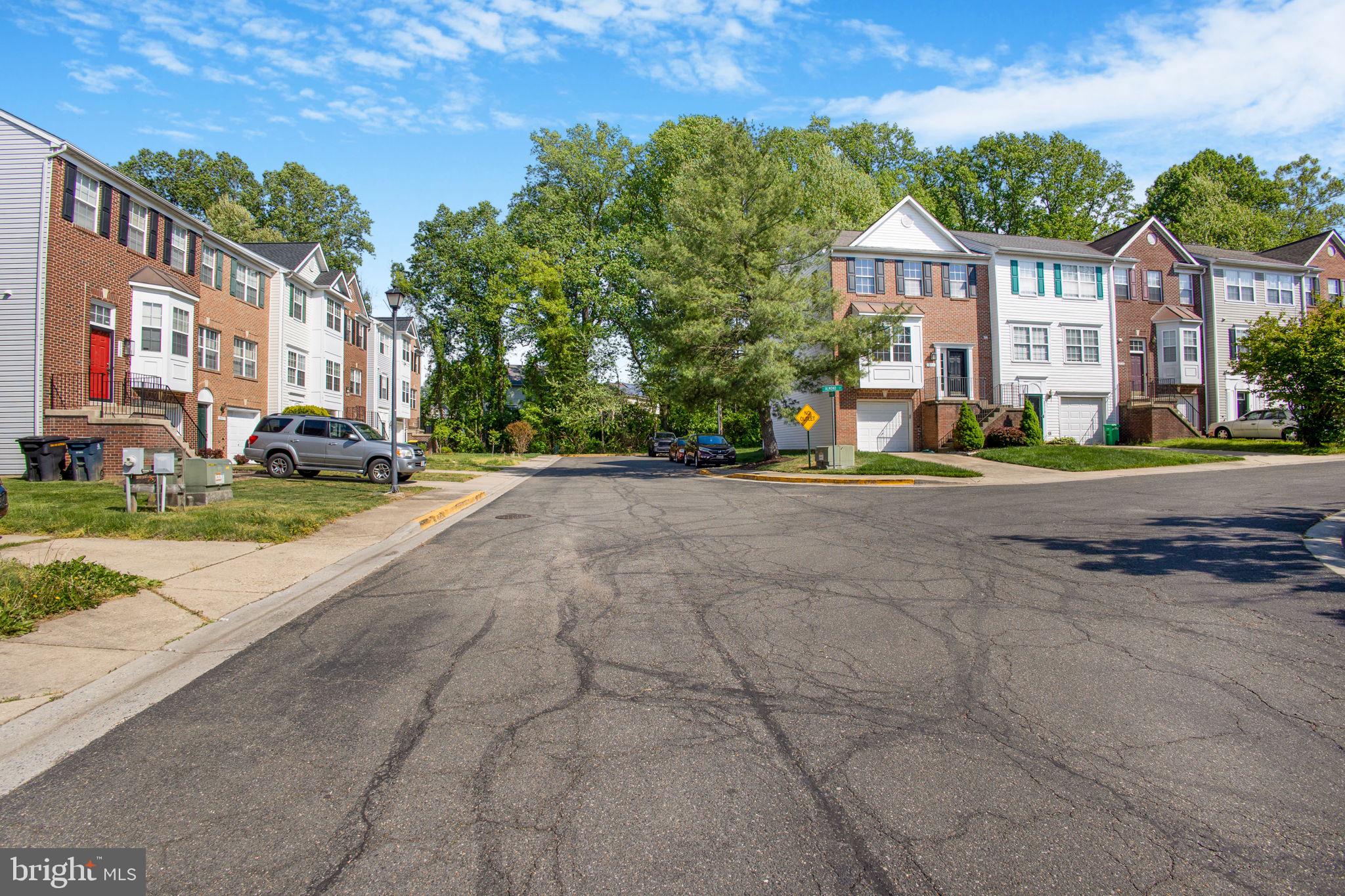 9820 Berrywood Court Bowie, MD 20721 - Photo 4 of 43 a view of a street with houses