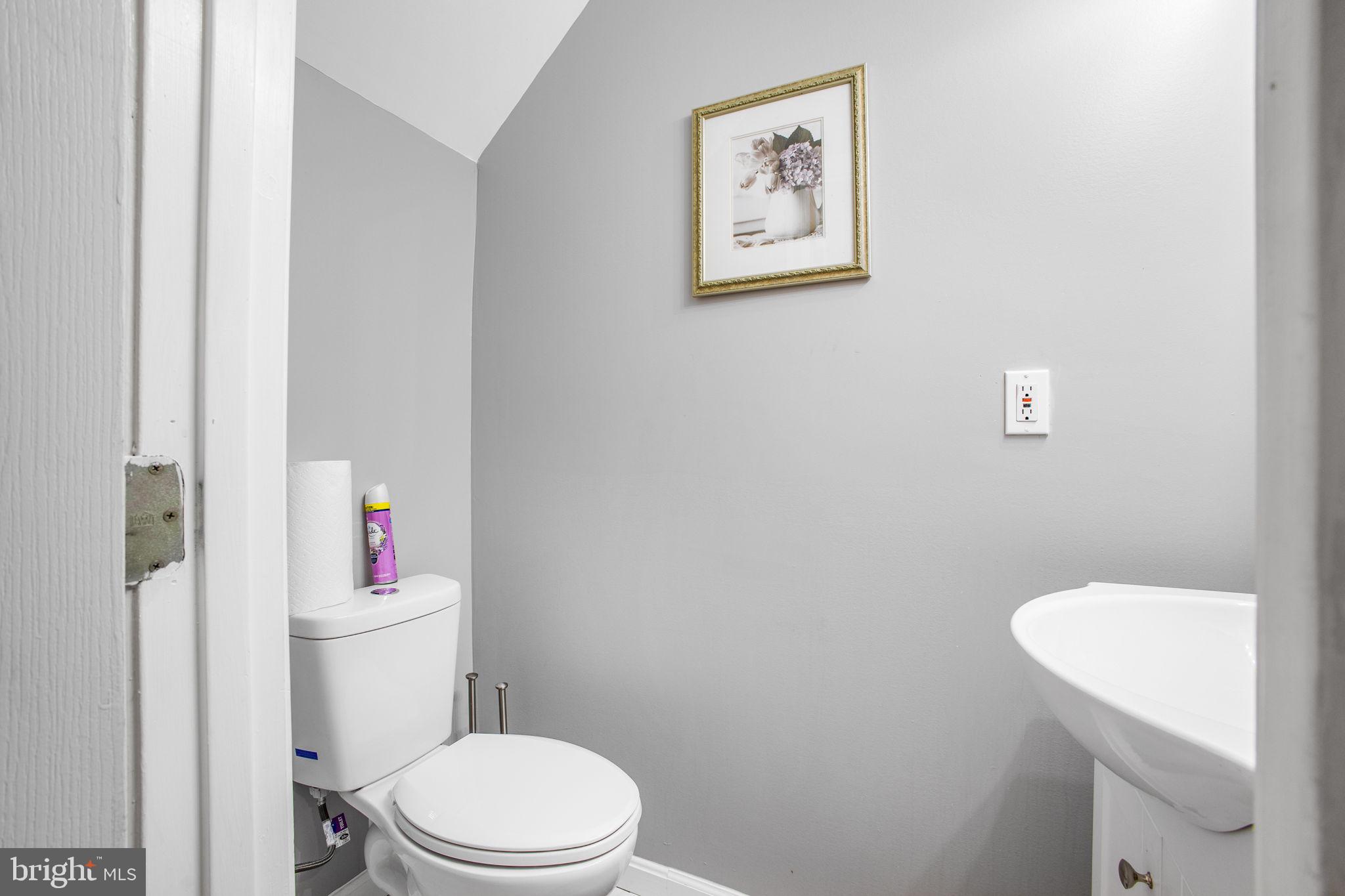 9820 Berrywood Court Bowie, MD 20721 - Photo 8 of 43 a white toilet sitting next to a white walls