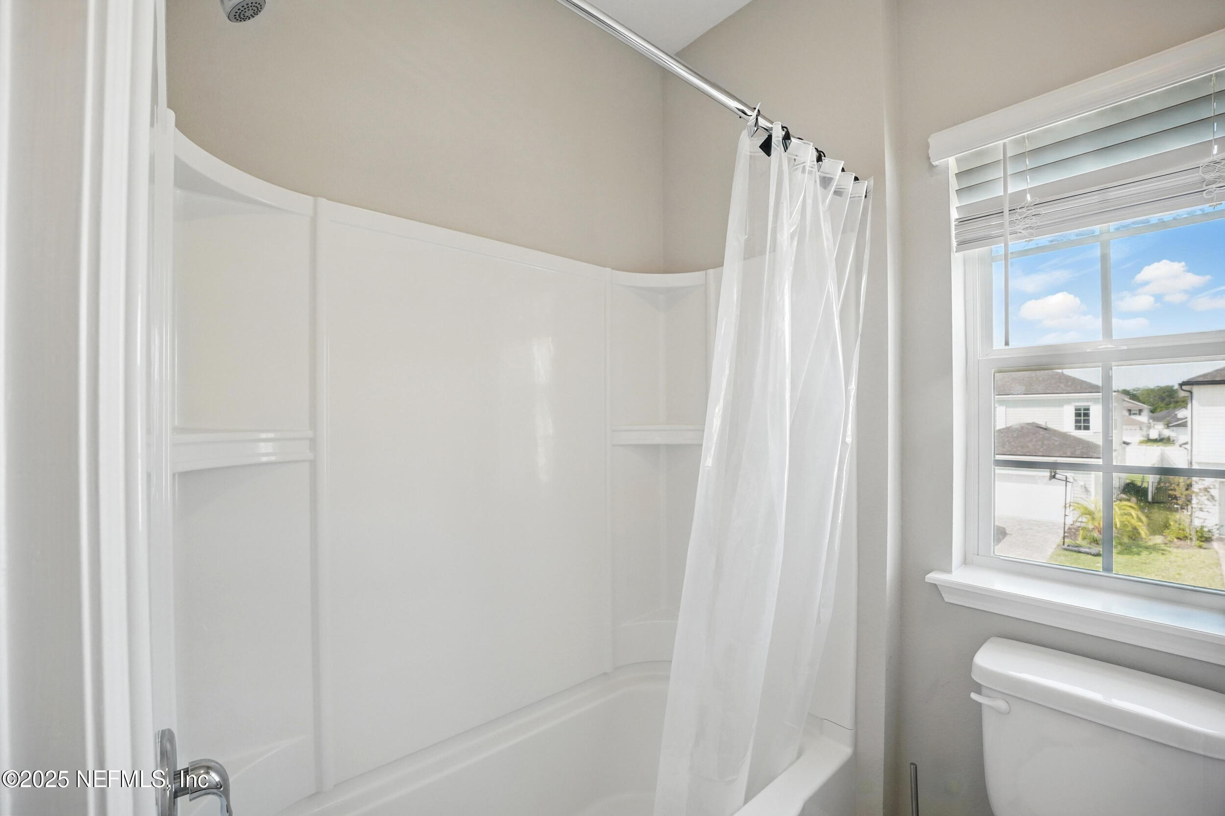 523 Silver Landing Drive St. Augustine, FL 32092 - Photo 33 of 63 a bathroom with a shower and a toilet