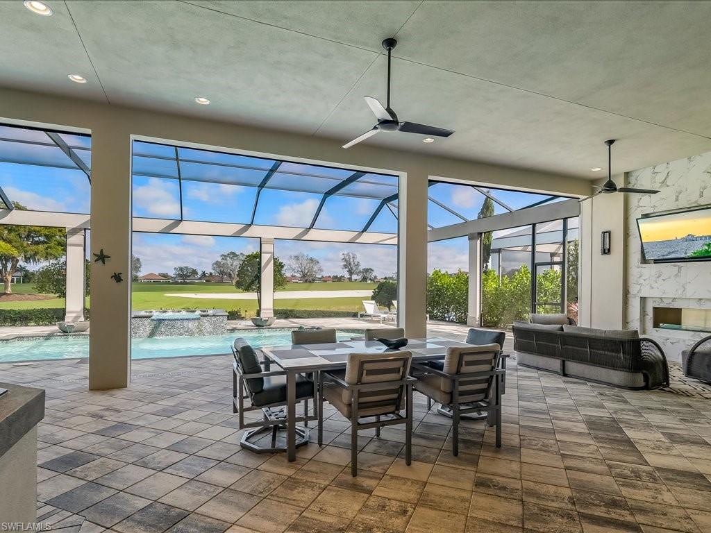 16337 Corsica Way Naples, FL 34110 - Photo 24 of 47 a view of a dining room with furniture window and outside view