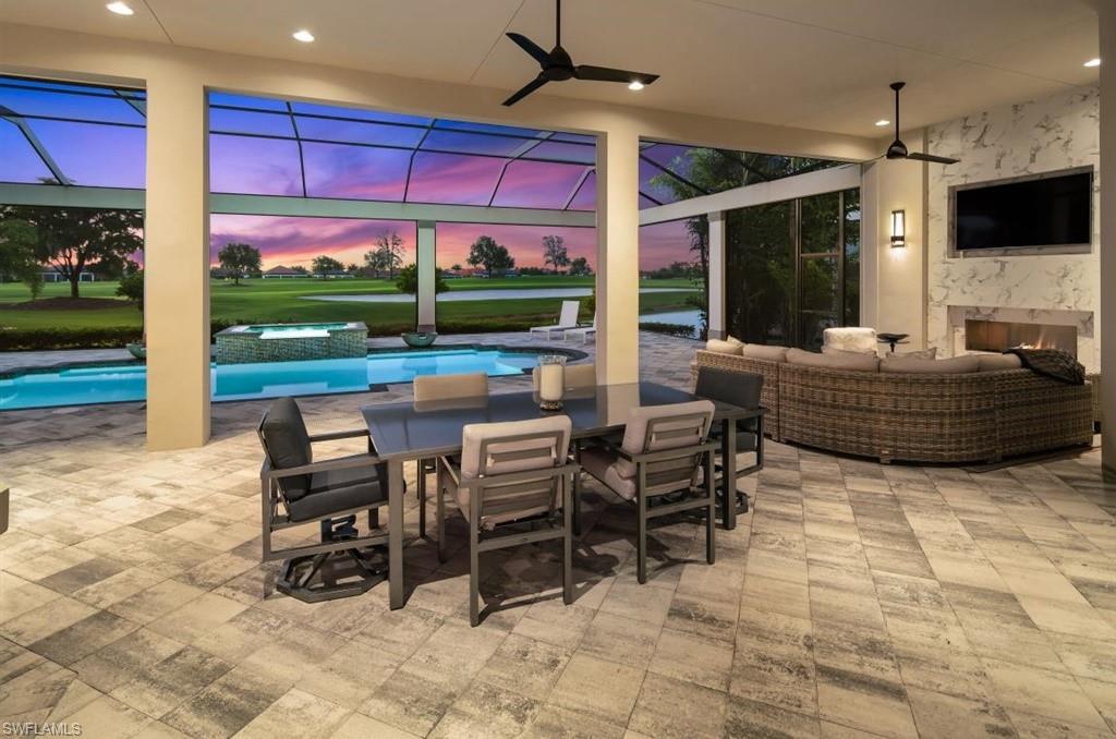 16337 Corsica Way Naples, FL 34110 - Photo 33 of 47 a outdoor space with the couches and dining table