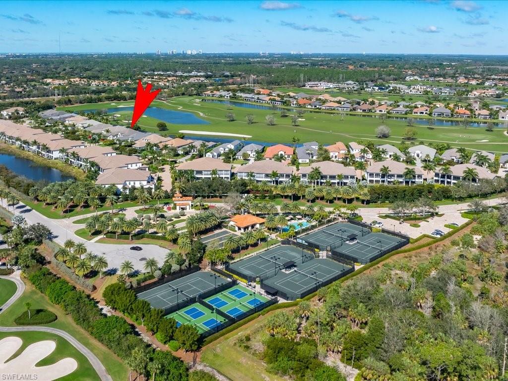 16337 Corsica Way Naples, FL 34110 - Photo 37 of 47 an aerial view of residential houses with outdoor space