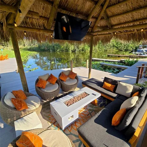 a outdoor space with lots of white furniture