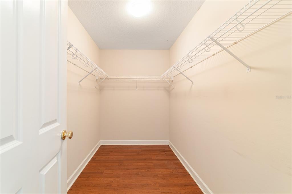 9611 Southwest 45th Avenue Ocala, FL 34476 - Photo 29 of 56 a view of a hallway with wooden floor