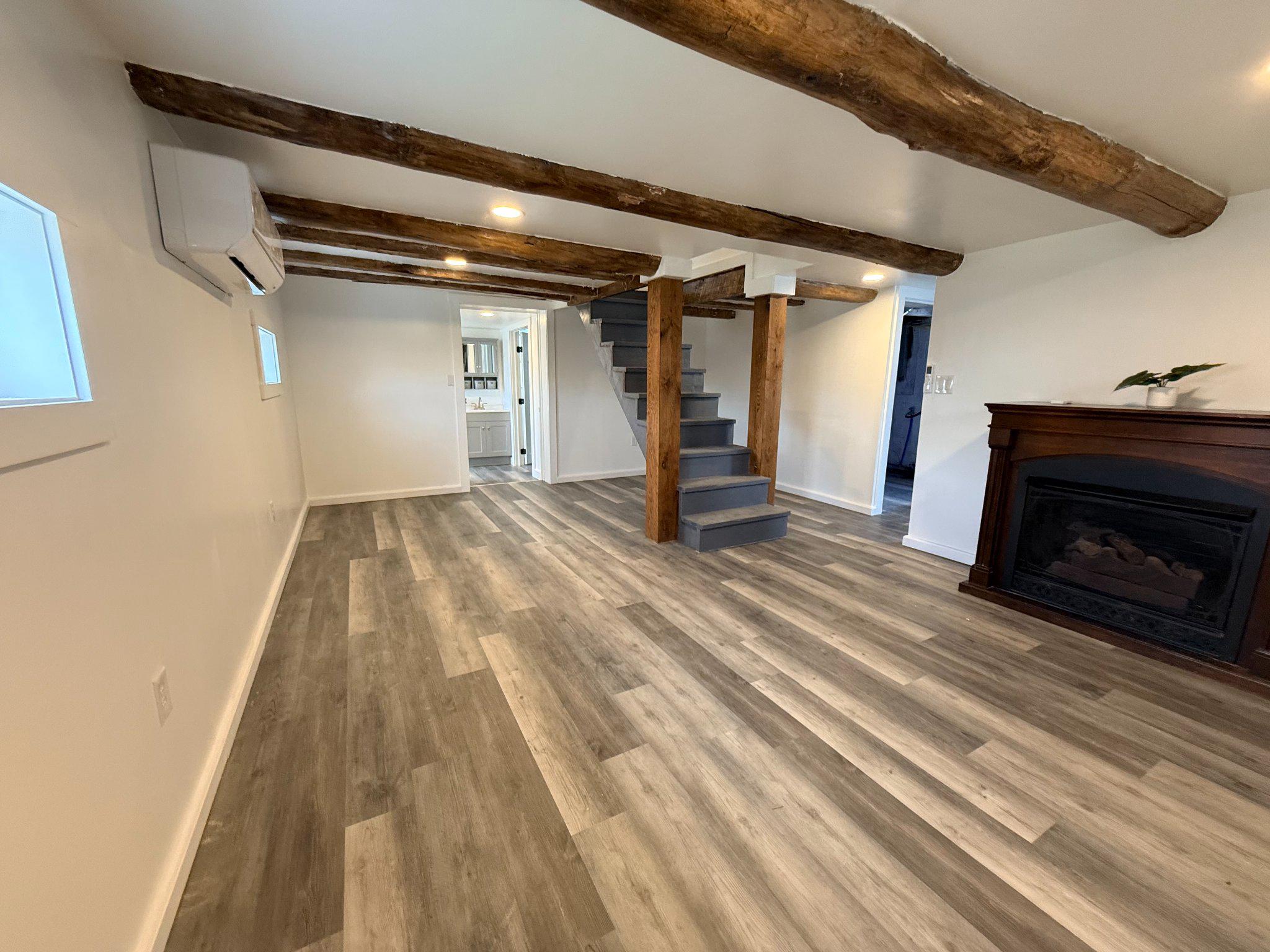 385 Herr Street Lock Haven, PA 17745 - Photo 11 of 21 Living room with exposed beams (main level)