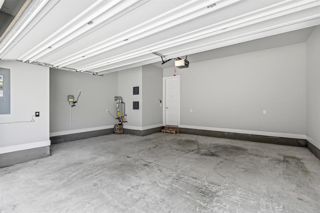 7129 Laurel Ridge Dallas, TX 75231 - Photo 27 of 35 Extra storage space in garage and room to open your vehicle's door!
