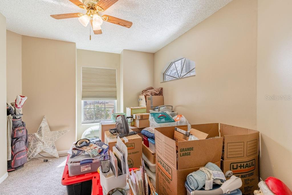 6555 Wilander Street Leesburg, FL 34748 - Photo 25 of 45 a living room with furniture and a window