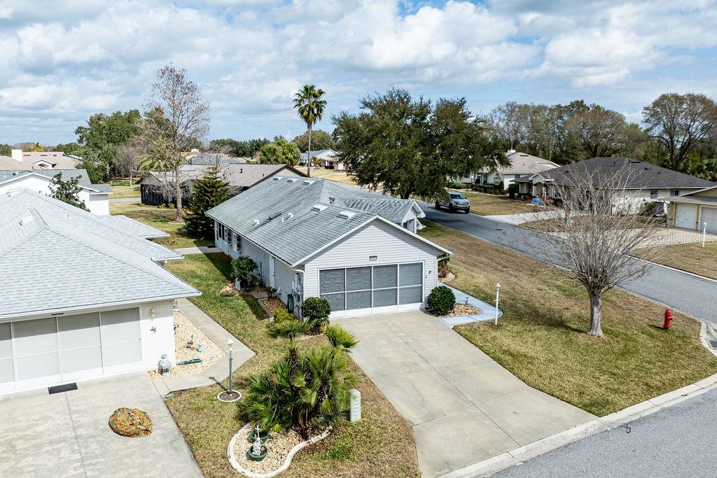6555 Wilander Street Leesburg, FL 34748 - Photo 31 of 45 a view of a house with a garden