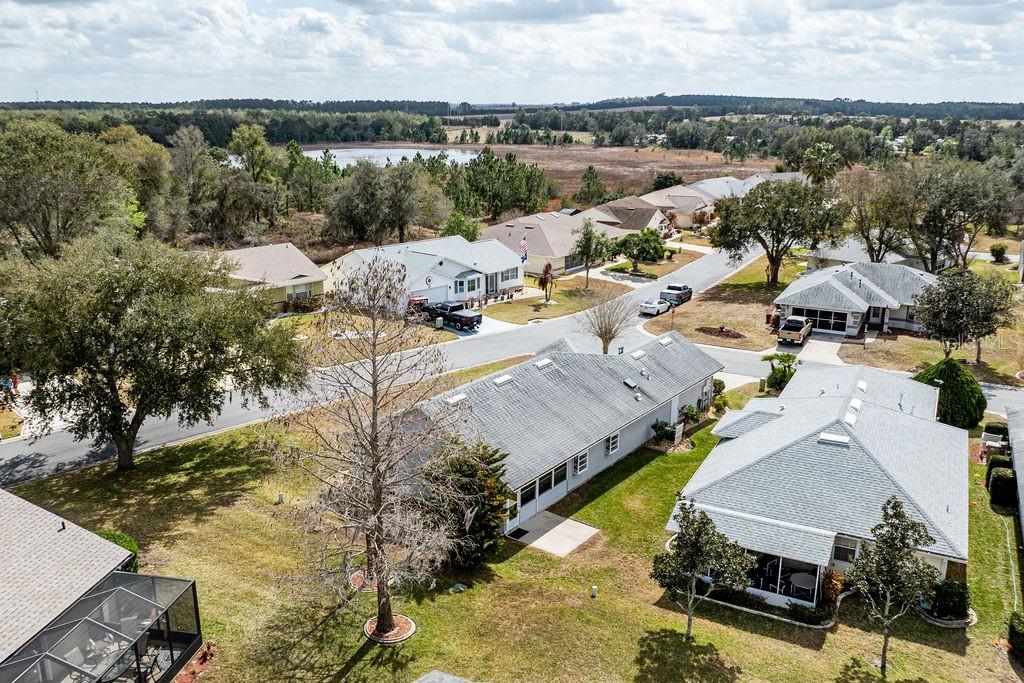 6555 Wilander Street Leesburg, FL 34748 - Photo 33 of 45 an aerial view of residential houses with outdoor space
