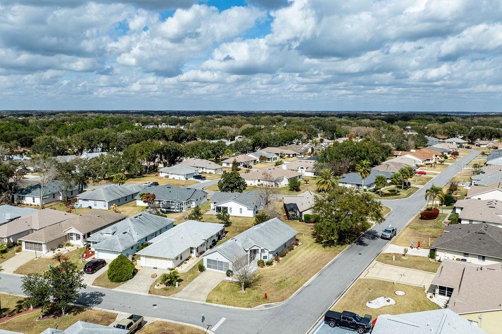6555 Wilander Street Leesburg, FL 34748 - Photo 35 of 45 an aerial view of a houses with outdoor space
